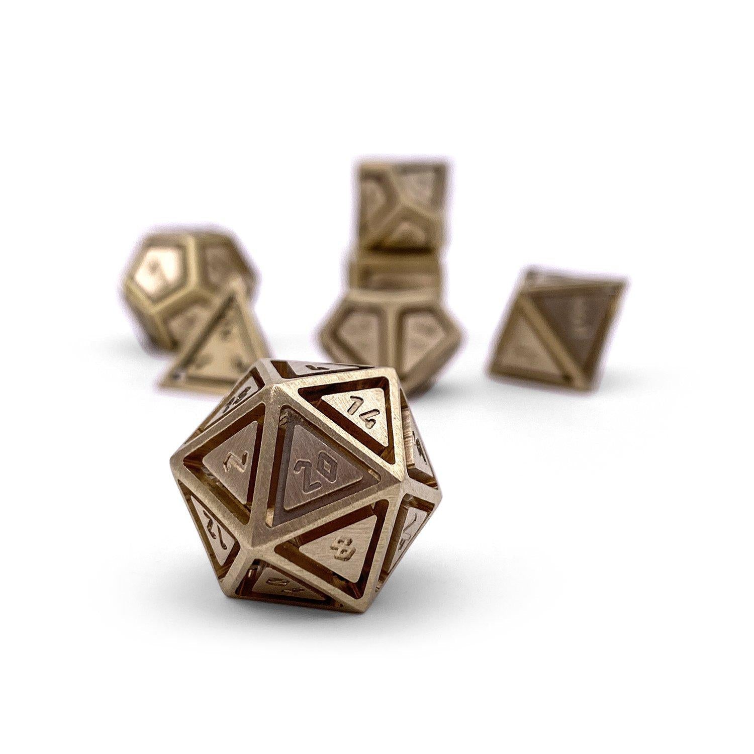 Brass - Nimbus™ 7 Piece RPG Set True Metal Dice-Metal Dice-Norse Foundry-Norse Foundry-dungeons & dragons-d&d dice set-rpg dice set-metal dice set-d&d-luxury dice-perfect for tabletop rpgs