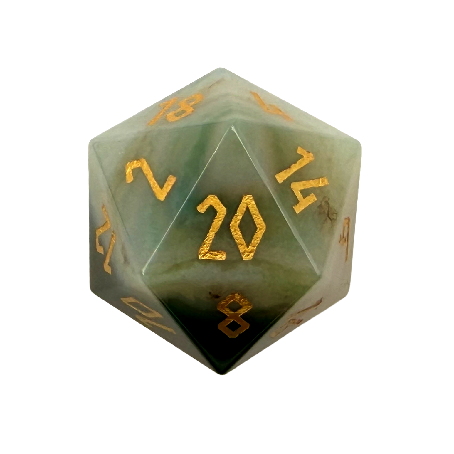 Green polyhedral dice with gold numbers on a white background