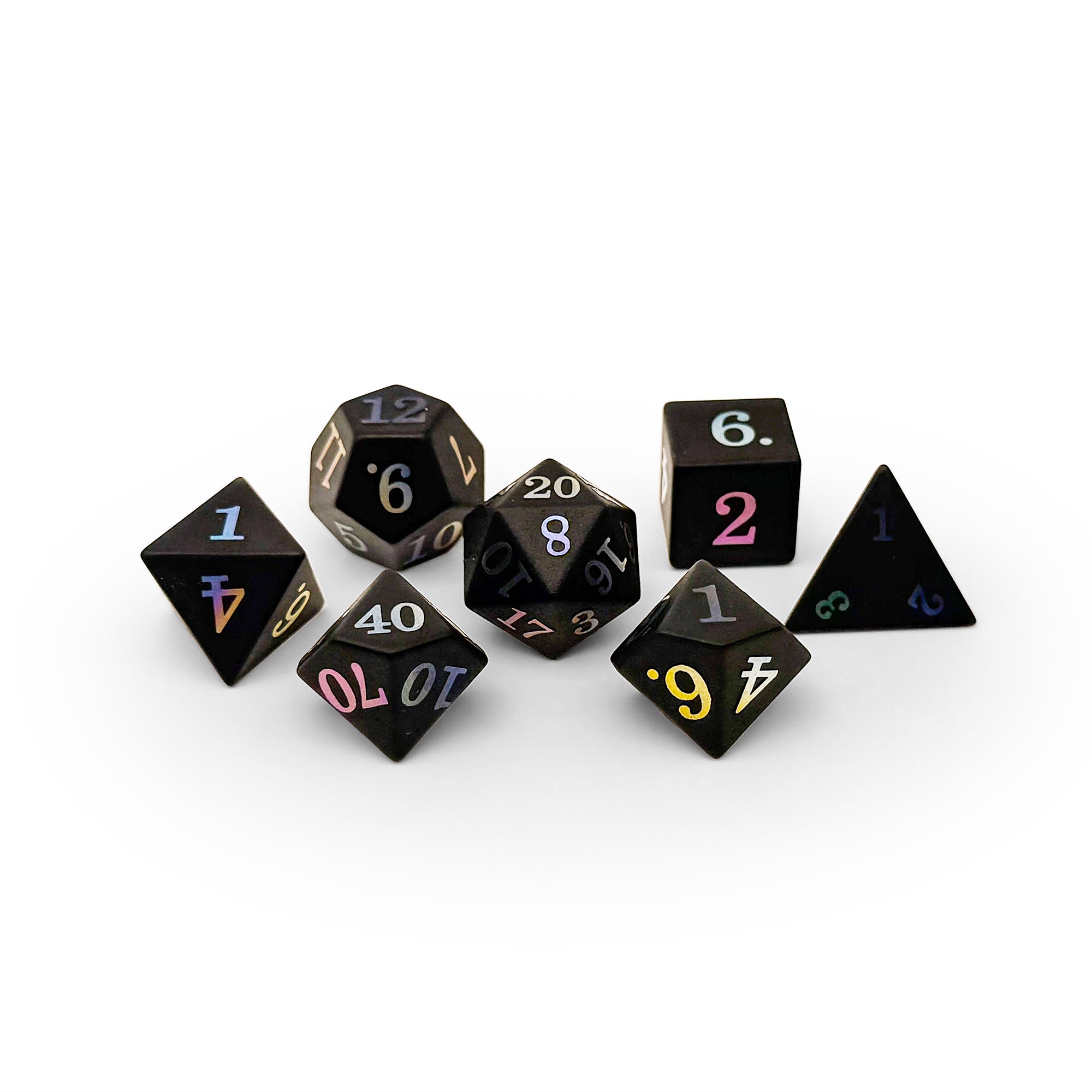 Set of black polyhedral dice with colorful numbers and symbols on a white background