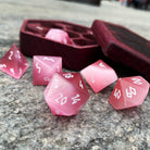 Pink Cats Eye - 7 Piece RPG Set Glass Dice-Glass Dice-Norse Foundry-Norse Foundry-cat's eye glass dice-dungeons & dragons-d&d dice set-rpg dice set-glass dice set-d&d-perfect for tabletop rpgs